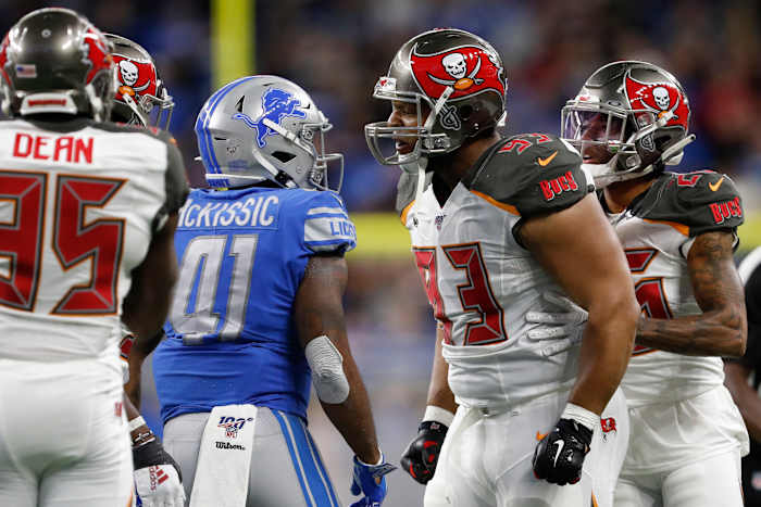 Tampa Bay Buccaneers nose tackle Ndamukong Suh (93) yells at Detroit Lions running back J.D. McKissic (41) during the second quarter at Ford Field.